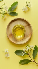 Jojoba oil extract natural organic ingredient on wooden plate - obrazy, fototapety, plakaty