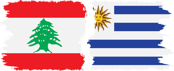 Naklejka premium Uruguay and Lebanon grunge flags connection vector