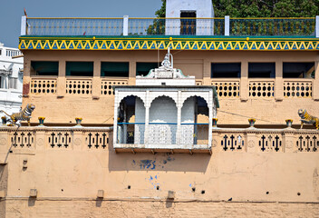 Colorful temple building on one of the 84 ghats of holy city Varanasi.