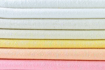 stack of colourful cotton clothes, close up pile of clothing - 788900854