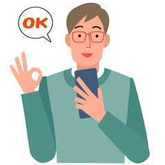 スマホを見ながらOKサインをする笑顔の男性の上半身