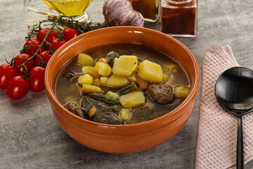 Soup with meatball and potato