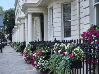 Fototapeta na wymiar London, row of elegant townhouses in Kensington or Belgravia