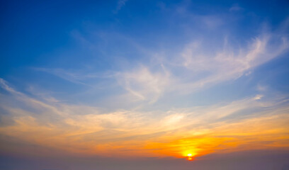 Colorful cirrus cloudy sky at sunset. Gradient warm cold color. Sky texture, abstract nature...