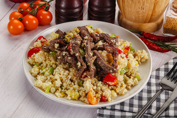 Traditional couscous with beef and vegetables