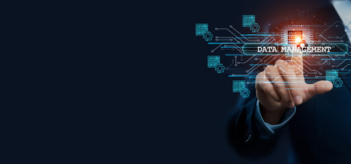 Businessman hand touching virtual graphical interface of data management. Idea for efficient solution and streamlined processes, innovation in modern global data management concept.