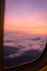 sunset and Fuji mountain see through window of airplane