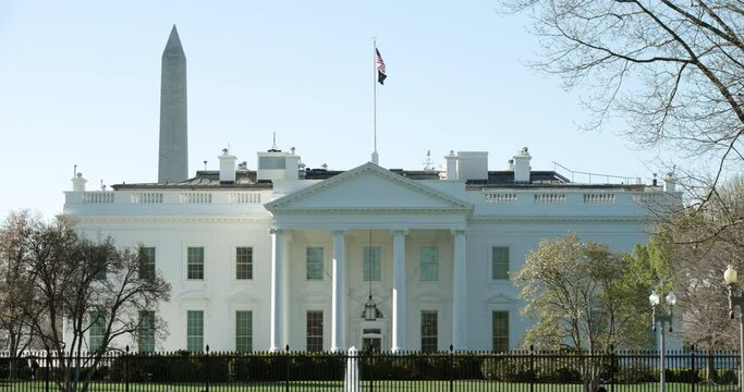 White House with Washington Monument Under Blue Sky