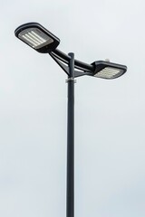 Modern LED street light lamp body on white background