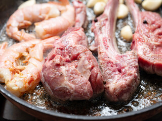 Grilled lamb ribs and vegetables
