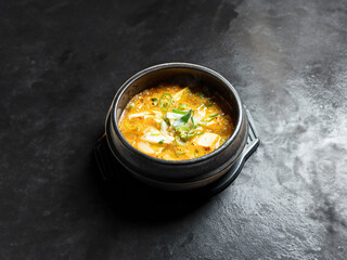 Soybean paste stew in an earthenware bowl, Korean food