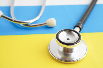 Ukraine flag with black stethoscope, Business and finance concept.