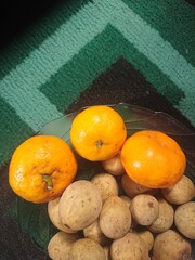 Fresh duku and orange fruit.
