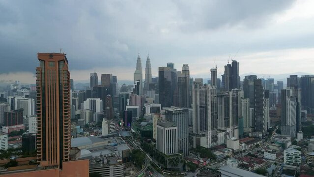 Kuala Lumpur Skyline In Early Evening Cloudy Tracking In