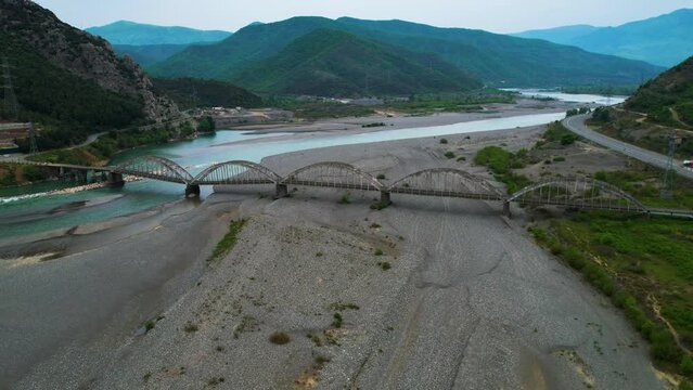 Historic Bridge of Mat in Albania from the Past Century: Arching Concrete and Iron Over the River Flowing from the Mountains