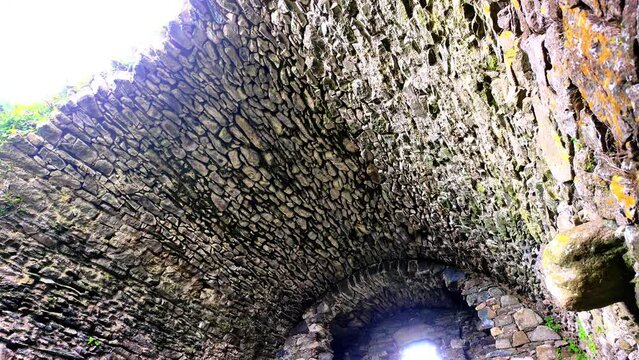 Vaulted ceiling of ruined Dunhill Castle interior ancient craftsmanship and design still stands today in Waterford Ireland