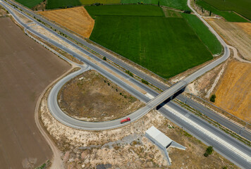 Highway and parallel high-speed rail tracks