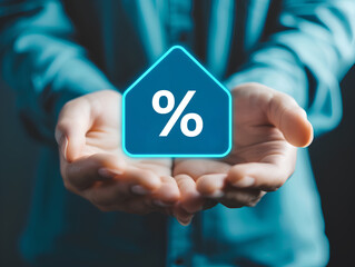 Housing finance, property tax, mortgage loan and interest rate, savings and economy concept. Hands holding a virtual percentage sign on house shaped, symbolizing discounts, finance, and statistics.