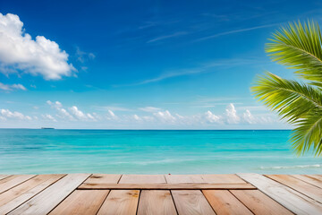 beach with sky,A wooden floor overlooking a clear blue sea with a palm tree.