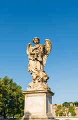 Fototapeta premium Rome, Italy. Figure of an Angel on the Ponte Sant'Angelo (Eliev's Bridge). Morning hours