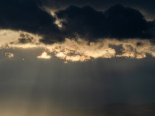 Ray lights dramatic sky sun disappear end day sunset evening orange sky