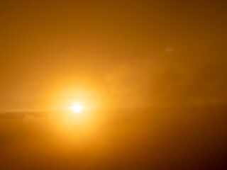 Last rays of light sun disappear end day dramatic sunset mountains evening orange sky