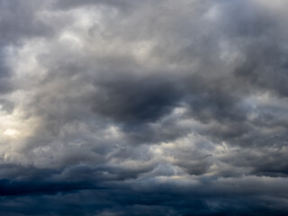 Dark blue moody sky clouds background overcast storm thunderstorm rainy weather gray