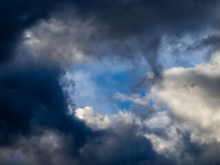 Dark blue moody sky clouds background overcast storm thunderstorm rainy weather gray
