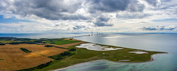 Korser, Denmark. Great Belt Road Bridge. Panorama in summer. Cloudy weather. Aerial view
