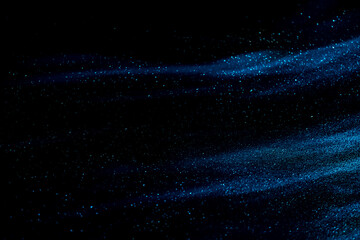 Obraz premium abstract blue speed camera motion background over glowing lights with sparkles, stars.