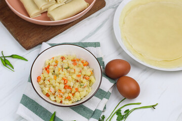 Ragout sayur for risoles filling, Indonesian traditional snack made from potato, carrot, and...