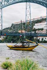 View of Rabelo boat, Dom Luis I bridge, unesco world heritage site and Douro river, porto, norte,...