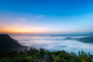 The sea of clouds before sunrise gives people a feeling of energy. View of the mountains...
