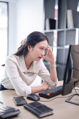 Investor businesswoman headache and stressed while reading business stock data on computer during working about stock and marketing of new startup to analysis trade and investment of business project - 788991030