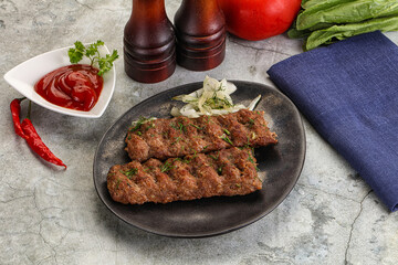 Kebab with beef served onion