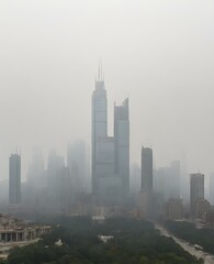 Fototapeta na wymiar Skyscrapers somewhere far off on a foggy day 