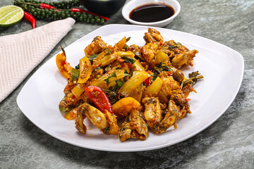 Vietnamese cuisine - fried frog with vegetables