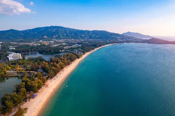 Sunset Bang Tao beach with lux hotel of Phuket paradise, Aerial top view. Concept tropical travel...