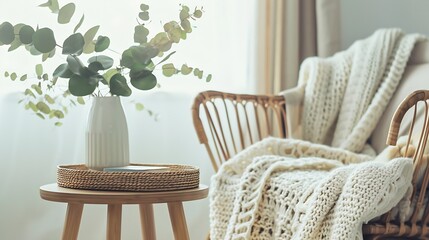 New furniture in cozy living room Modern interior design in loft apartment White knitted blanket on bamboo armchair side table with wicker tray and eucalyptus branch in ceramic vase cl : Generative AI