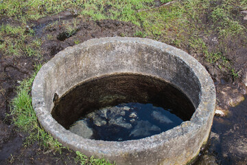 A small well with spring water outside the city
