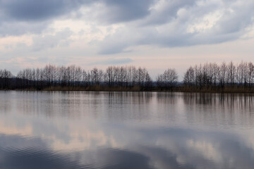 reflection of the sky in the lake at sunset