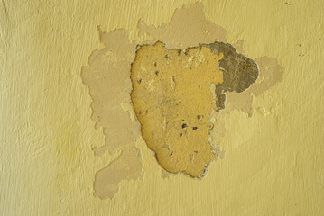 Aged wall with scratches and dirt and damaged paint. Textured background.