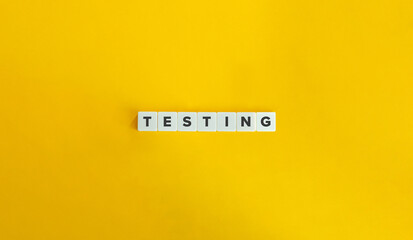 Testing Word. Concept of Evaluating the Functionality, Quality, or Performance of a Product, System, or Component. Text on Block Letter Tiles on Yellow Background. Minimal Aesthetics.