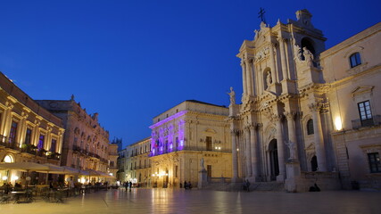 Piazza del Duomo (Duomo Square), with the Duomo Cathedral, Ortigia Island, Syracuse, Sicily, Italy. Picture taken in the evening at blue hour