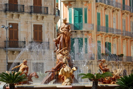 Artemis fountain (or Diana fountain, dating from 1906) located on Piazza Archimede (Archimede square) in Ortigia Island, Syracuse, Sicily, Italy