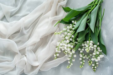Bouquet of the lily of the valley on light background .