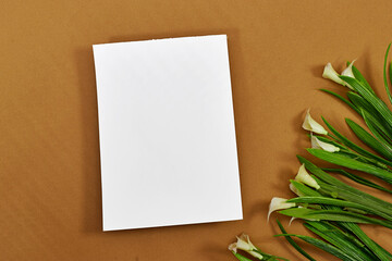 Blank greeting card, flyer or invitation card mockup with calla lilies, Valentines or women's day...