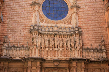 Sculptures on the facade of the basilica at the Benedictine Abbey-Montserrat Monastery. Spain