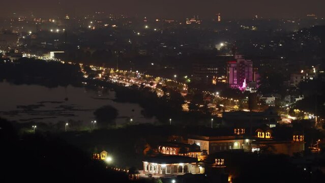 Jaipur, Rajasthan, India. Night City Life. Evening Night City Traffic And Highrise Houses. Night Light Lighting Time Lapse, Timelapse, Time-lapse. Night Scenic View Of City Center.