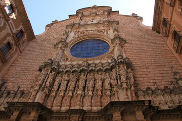 Facade of church in a Benedict monastery of Santa Maria de Montserrat situated in Catalonia, Spain